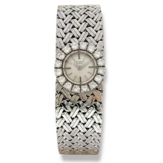 Universal Geneva Or Blanc 18 carats serti de diamants